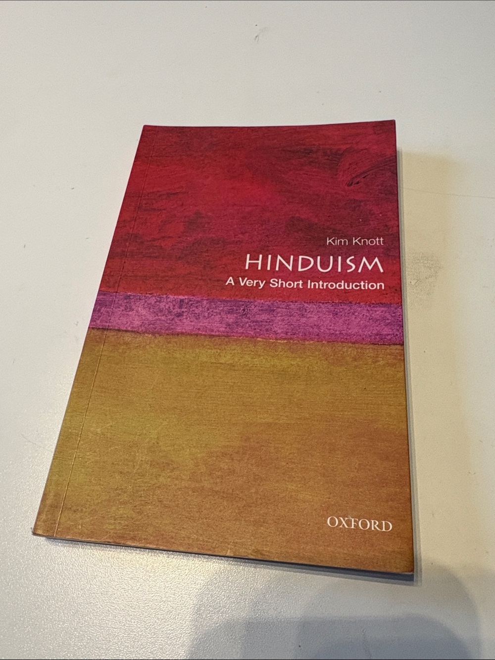 Oxford cover poster in red, purple and brown tones